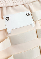 Minifalda con cintas industriales entrelazadas | MWM [PS_COLORS:IVORY]