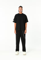 Camiseta Relaxed Fit con manga caída y X de cordones cruzados | MWM [PS_COLORS:BLACK]