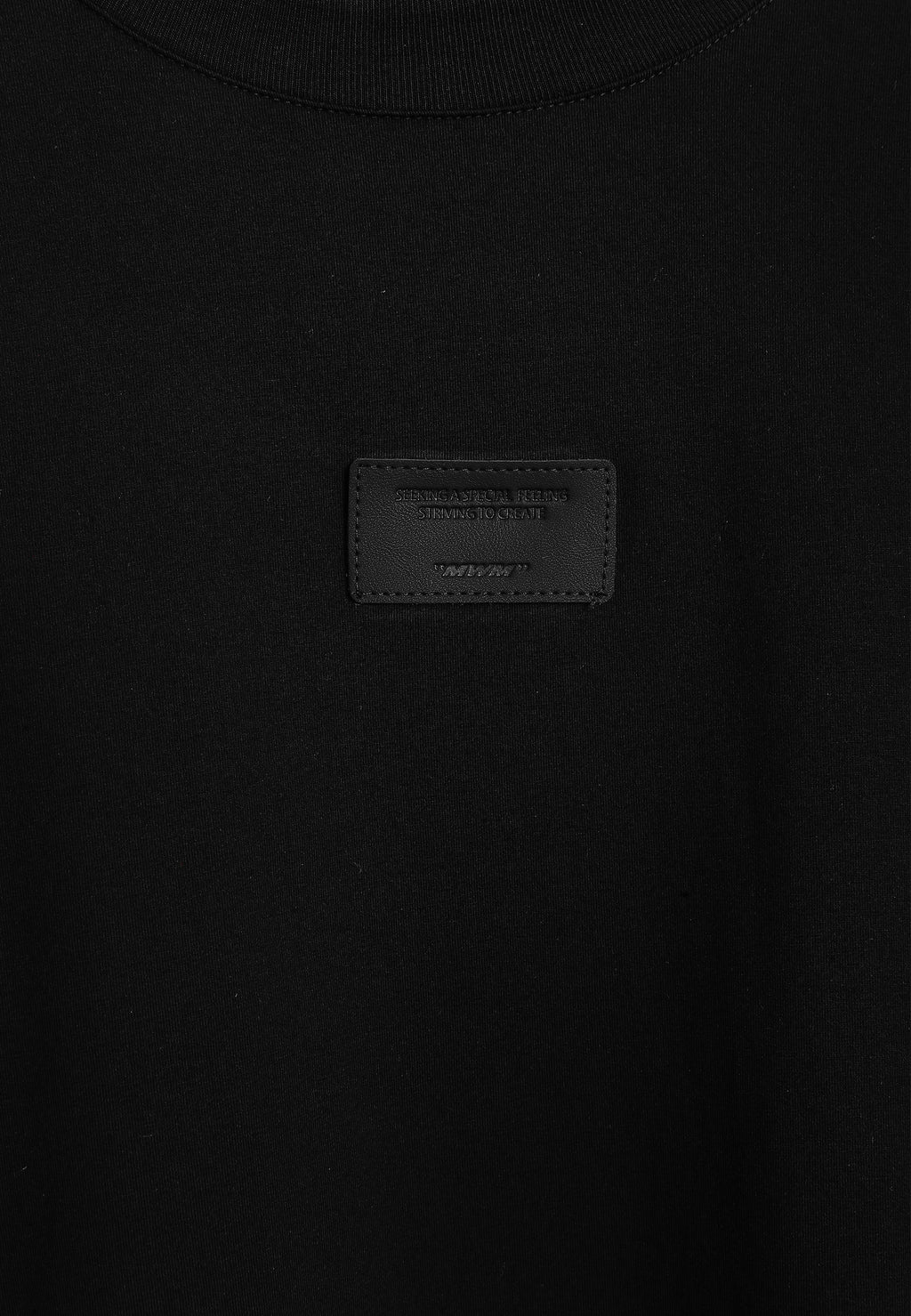 Camiseta Wings de corte relajado con alas de tachuelas en la espalda | MWM [PS_COLORS:BLACK]