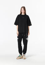 Camiseta Wings de corte relajado con alas de tachuelas en la espalda | MWM [PS_COLORS:BLACK]