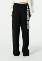Pantalón Básico con pinzas, bajos ajustables y cadena lateral | MWM [PS_COLORS:BLACK]