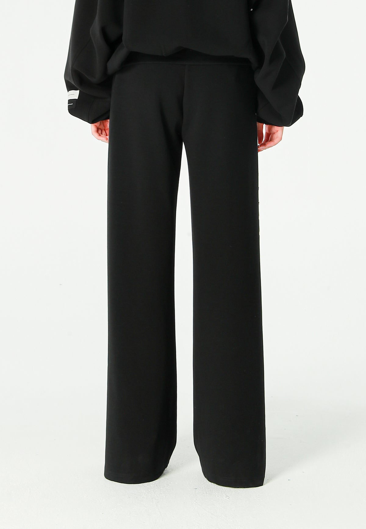 Pantalón palazzo de mujer de pierna ancha con efecto faja y tachuelas laterales | MWM [PS_COLORS:BLACK]