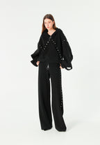 Pantalón palazzo de mujer de pierna ancha con efecto faja y tachuelas laterales | MWM [PS_COLORS:BLACK]