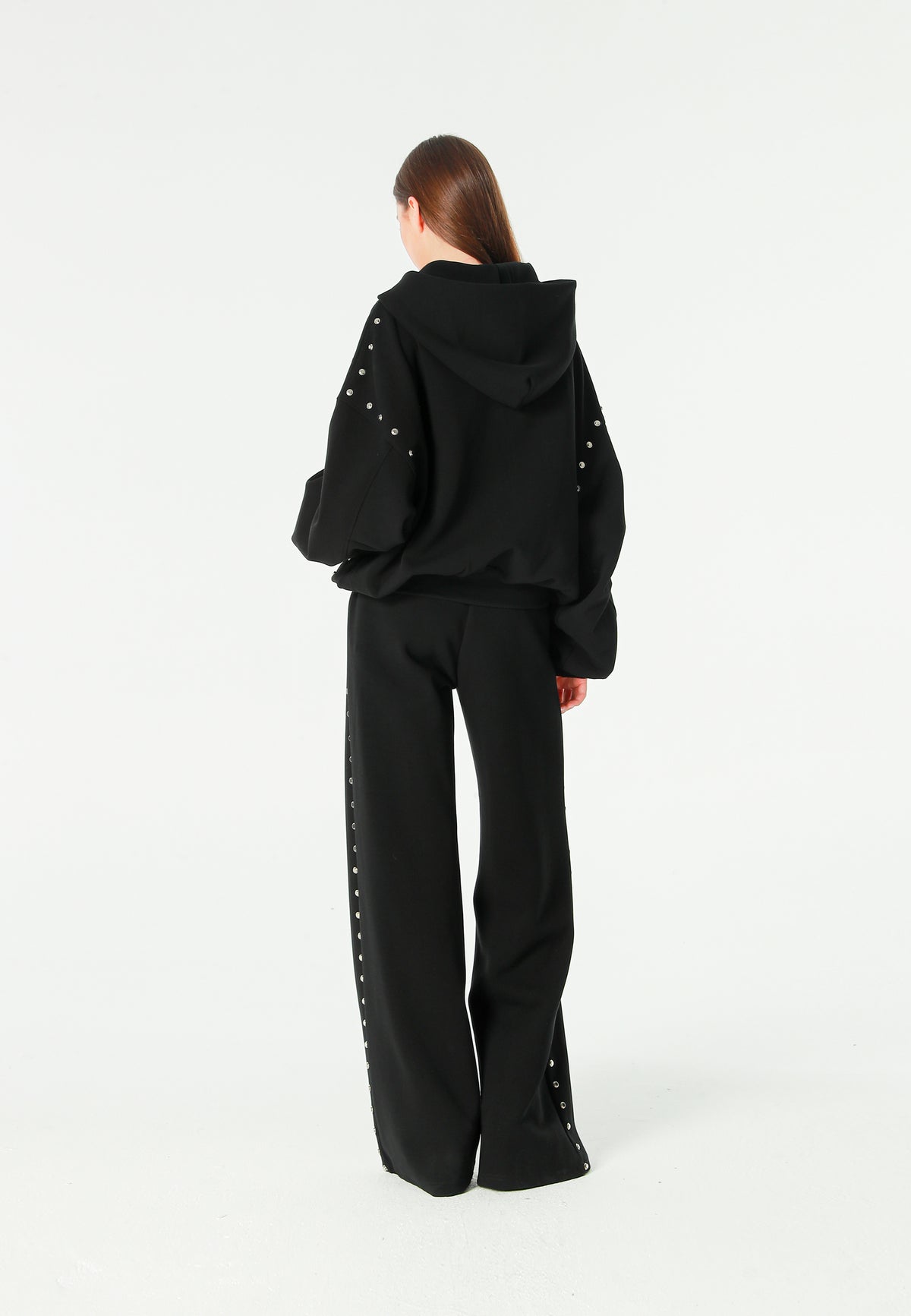 Pantalón palazzo de mujer de pierna ancha con efecto faja y tachuelas laterales | MWM [PS_COLORS:BLACK]