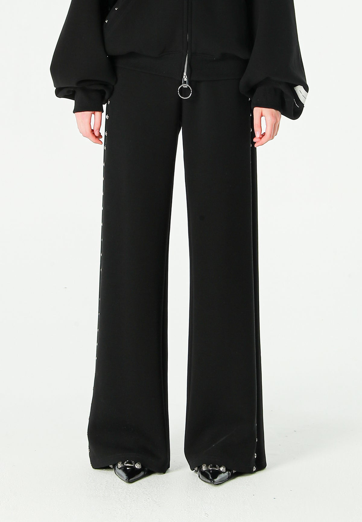 Pantalón palazzo de mujer de pierna ancha con efecto faja y tachuelas laterales | MWM [PS_COLORS:BLACK]