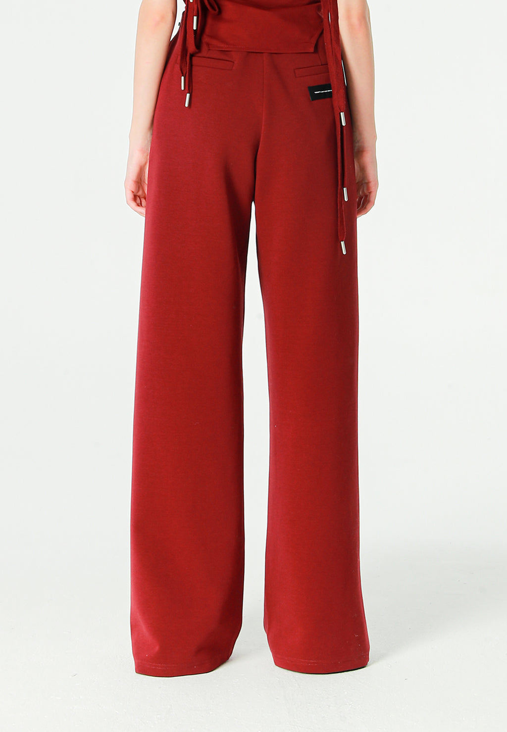 Pantalón palazzo de mujer de pierna ancha con efecto faja y tachuelas laterales | MWM [PS_COLORS:BURGUNDY]