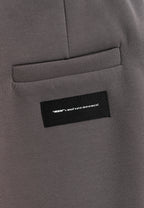 Pantalón palazzo de mujer de pierna ancha con efecto faja y tachuelas laterales | MWM [PS_COLORS:GREY]