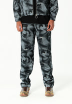 Pantalón de corte recto y relajado en jacquard de chenilla con brillo | MWM [PS_COLORS:BLACK]