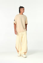 Pantalón barrel con cintas asimétricas MWM y bajos ajustables | MWM [PS_COLORS:BEIGE]