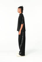 Pantalón barrel con cintas asimétricas MWM y bajos ajustables | MWM [PS_COLORS:BLACK]