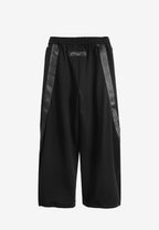 Pantalón barrel con cintas asimétricas MWM y bajos ajustables | MWM [PS_COLORS:BLACK]