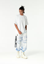 Pantalón jogger con paisaje alpino full-print y cintura elástica | MWM [PS_COLORS:BLUE]