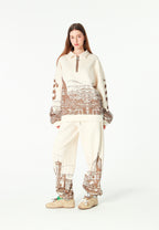 Pantalón jogger con paisaje alpino full-print y cintura elástica | MWM [PS_COLORS:BROWN]