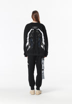 Pantalón jogger Wings con parches de estrellas y cadena lateral | MWM [PS_COLORS:BLACK]
