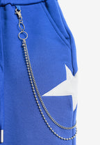 Pantalón jogger Wings con parches de estrellas y cadena lateral | MWM [PS_COLORS:BLUE]