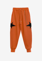 Pantalón jogger Wings con parches de estrellas y cadena lateral | MWM [PS_COLORS:ORANGE]