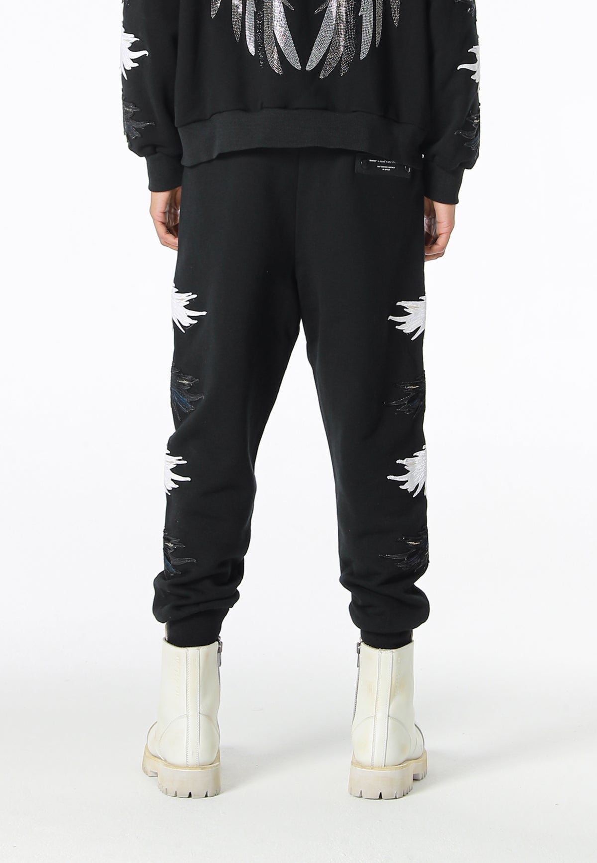 Pantalón jogger Wings con parches Mini Wings en los laterales | MWM [PS_COLORS:BLACK]