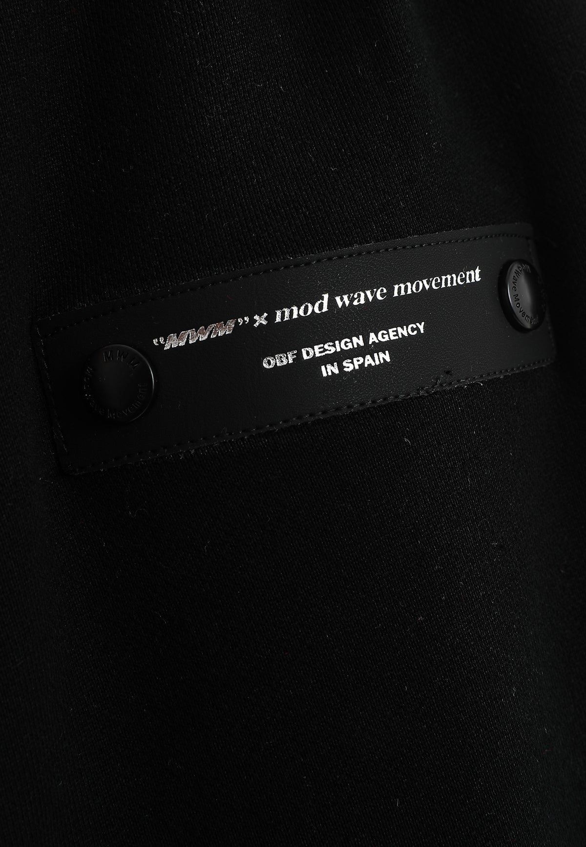 Pantalón jogger Wings con parches Mini Wings en los laterales | MWM [PS_COLORS:BLACK]