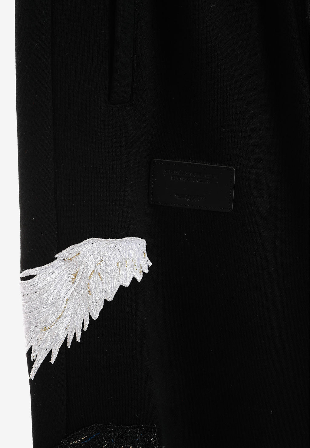Pantalón jogger Wings con parches Mini Wings en los laterales | MWM [PS_COLORS:BLACK]