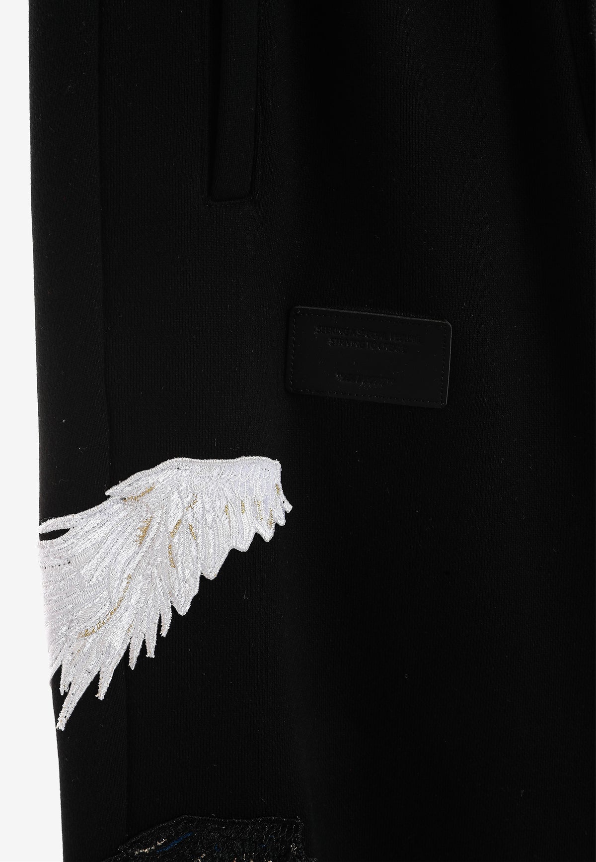 Pantalón jogger Wings con parches Mini Wings en los laterales | MWM [PS_COLORS:BLACK]