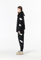 Pantalón jogger Wings con parches Mini Wings en los laterales | MWM [PS_COLORS:BLACK]