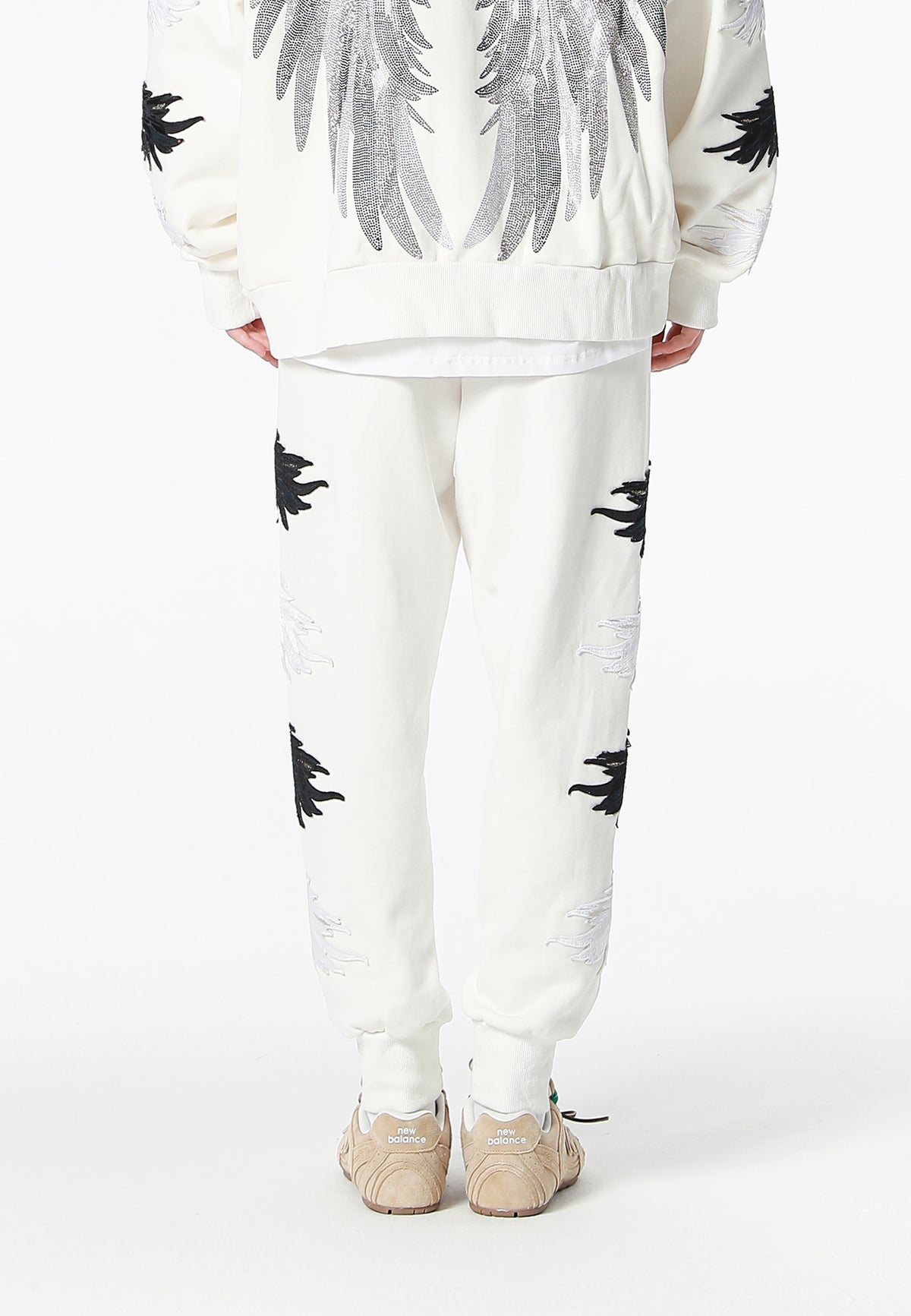 Pantalón jogger Wings con parches Mini Wings en los laterales | MWM [PS_COLORS:WHITE]