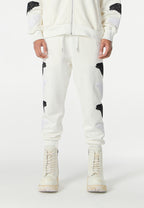 Pantalón jogger Wings con parches Mini Wings en los laterales | MWM [PS_COLORS:BLACK,WHITE]
