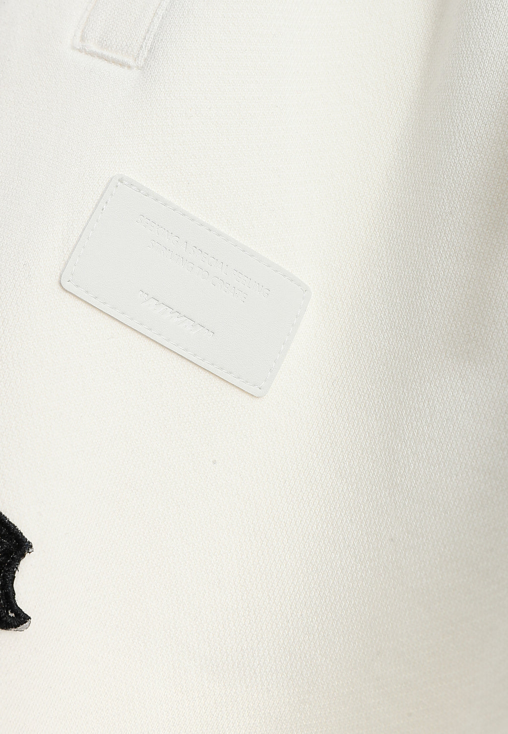 Pantalón jogger Wings con parches Mini Wings en los laterales | MWM [PS_COLORS:WHITE]