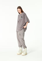 Pantalón jogger Vanguard Dogs con bolsillo cargo lateral y bordado trasero | MWM [PS_COLORS:GREY]
