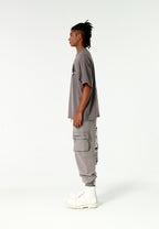 Pantalón jogger Vanguard Dogs con bolsillo cargo lateral y bordado trasero | MWM [PS_COLORS:GREY]