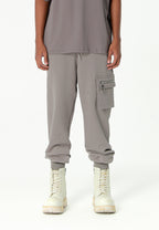 Pantalón jogger Vanguard Dogs con bolsillo cargo lateral y bordado trasero | MWM [PS_COLORS:GREY]