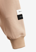 Sudadera con capucha, cremallera frontal, mangas globo y tachuelas metálicas | MWM [PS_COLORS:BEIGE]