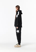 Sudadera con capucha Wings de corte relajado con estrellas frontales y alas en la espalda | MWM [PS_COLORS:BLACK]