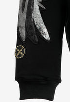 Sudadera Wings de corte relajado con alas de tachuelas en hombros y mangas | MWM [PS_COLORS:BLACK]