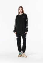 Sudadera Wings de corte relajado con alas de tachuelas en hombros y mangas | MWM [PS_COLORS:BLACK]