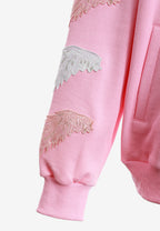 Sudadera con capucha Wings de corte relajado con Mini Wings en mangas y alas de strass en la espalda | MWM [PS_COLORS:PINK]