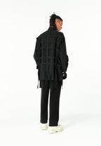 Camisa oversize con diseño entrelazado y motivo circular bordado | MWM [PS_COLORS:BLACK]