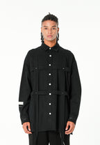Camisa oversize con diseño entrelazado y motivo circular bordado | MWM [PS_COLORS:BLACK]