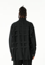 Camisa oversize con diseño entrelazado y motivo circular bordado | MWM [PS_COLORS:BLACK]