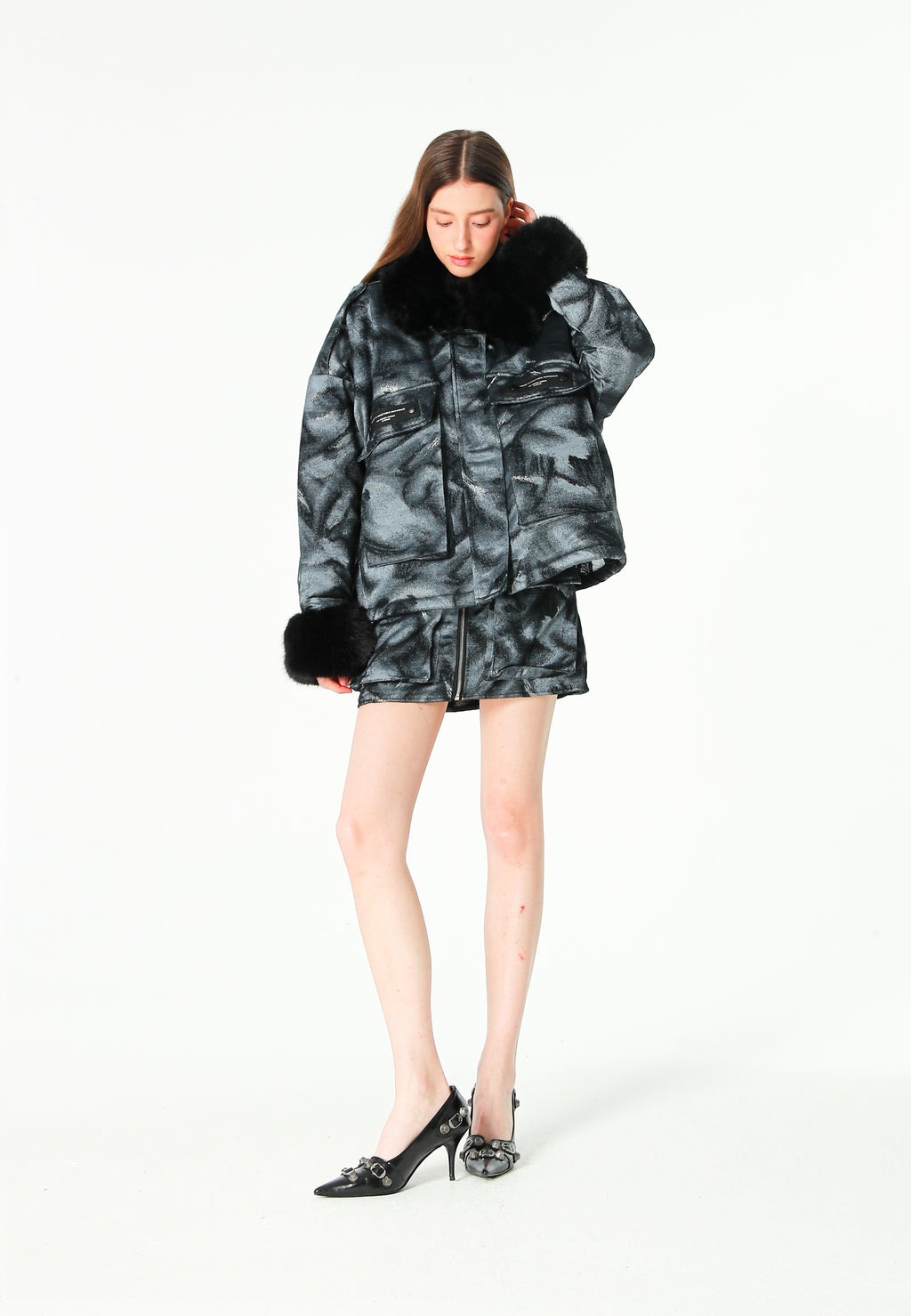 Minifalda jacquard de chenilla con brillo, cremallera y bolsillos frontales | MWM [PS_COLORS:BLACK]