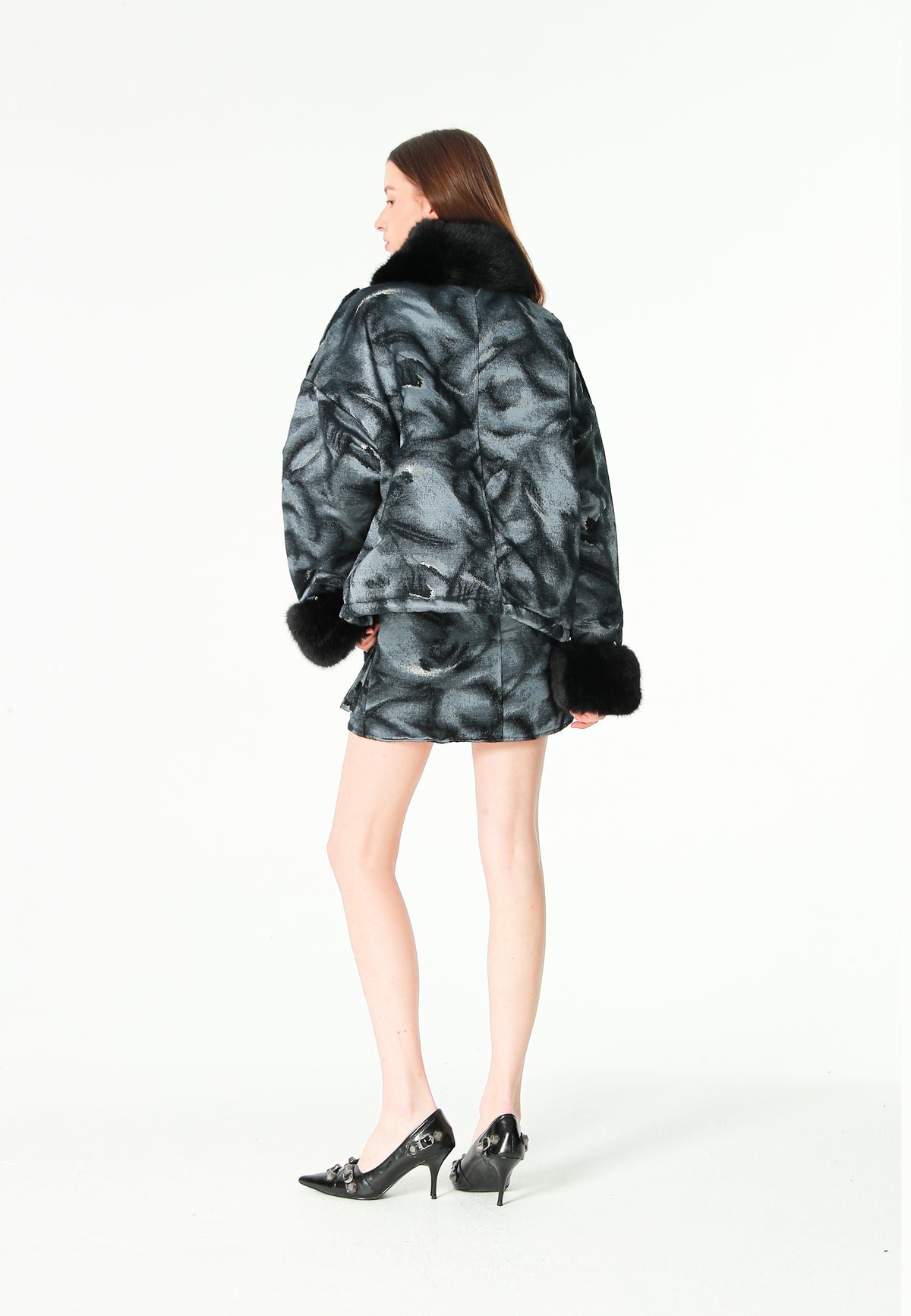 Minifalda jacquard de chenilla con brillo, cremallera y bolsillos frontales | MWM [PS_COLORS:BLACK]