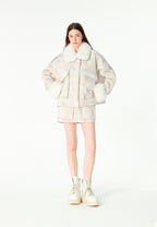 Minifalda jacquard de chenilla con brillo, cremallera y bolsillos frontales | MWM [PS_COLORS:IVORY]