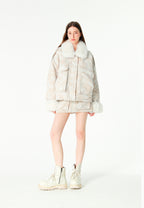 Minifalda jacquard de chenilla con brillo, cremallera y bolsillos frontales | MWM [PS_COLORS:IVORY]