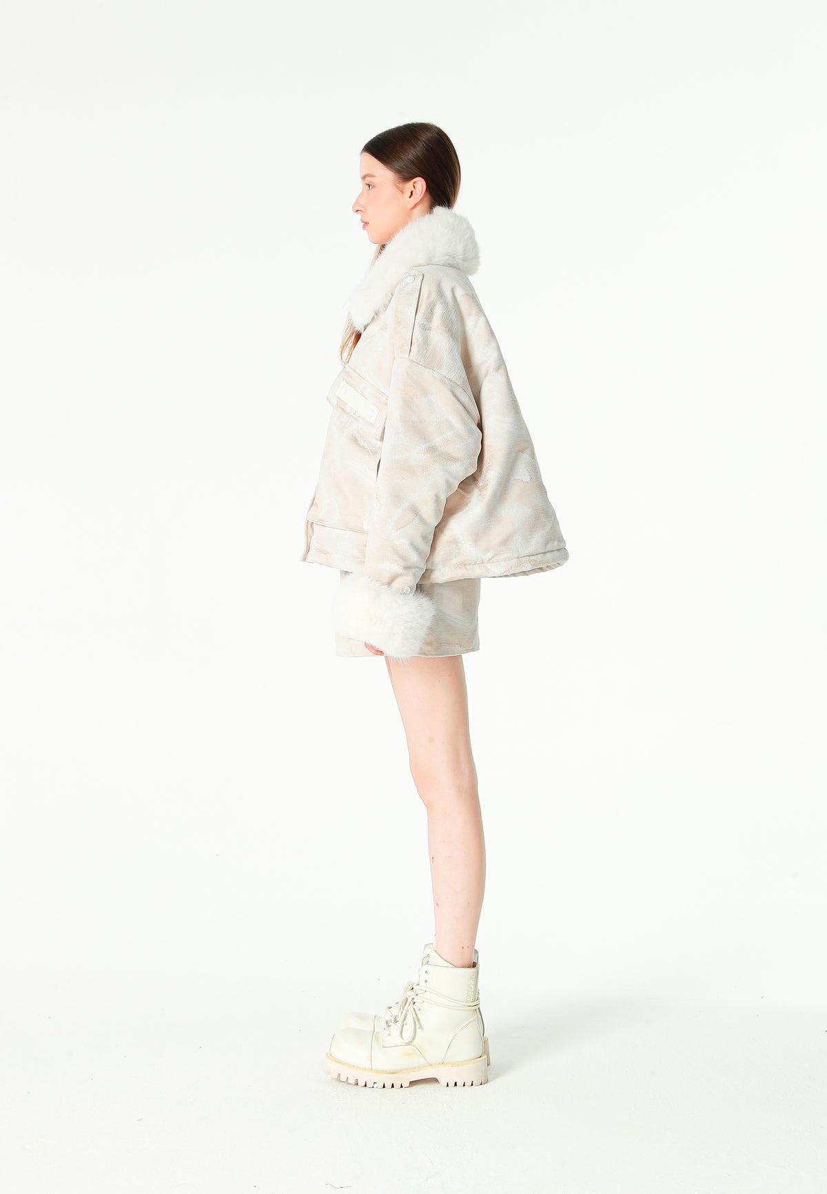 Minifalda jacquard de chenilla con brillo, cremallera y bolsillos frontales | MWM [PS_COLORS:IVORY]