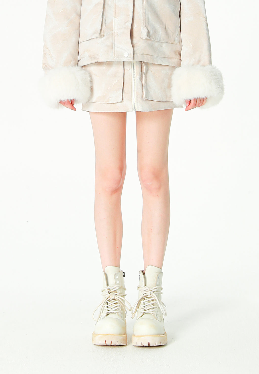Minifalda jacquard de chenilla con brillo, cremallera y bolsillos frontales | MWM [PS_COLORS:IVORY]