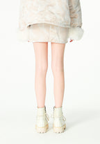 Minifalda jacquard de chenilla con brillo, cremallera y bolsillos frontales | MWM [PS_COLORS:IVORY]