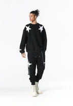 Sudadera Wings de corte relajado con estrellas frontales y doble parche de alas en la espalda | MWM [PS_COLORS:BLACK]