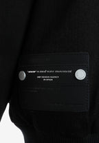 Chaqueta bomber vaquera con grandes bolsillos frontales y botones MWM en las mangas | MWM [PS_COLORS:BLACK]