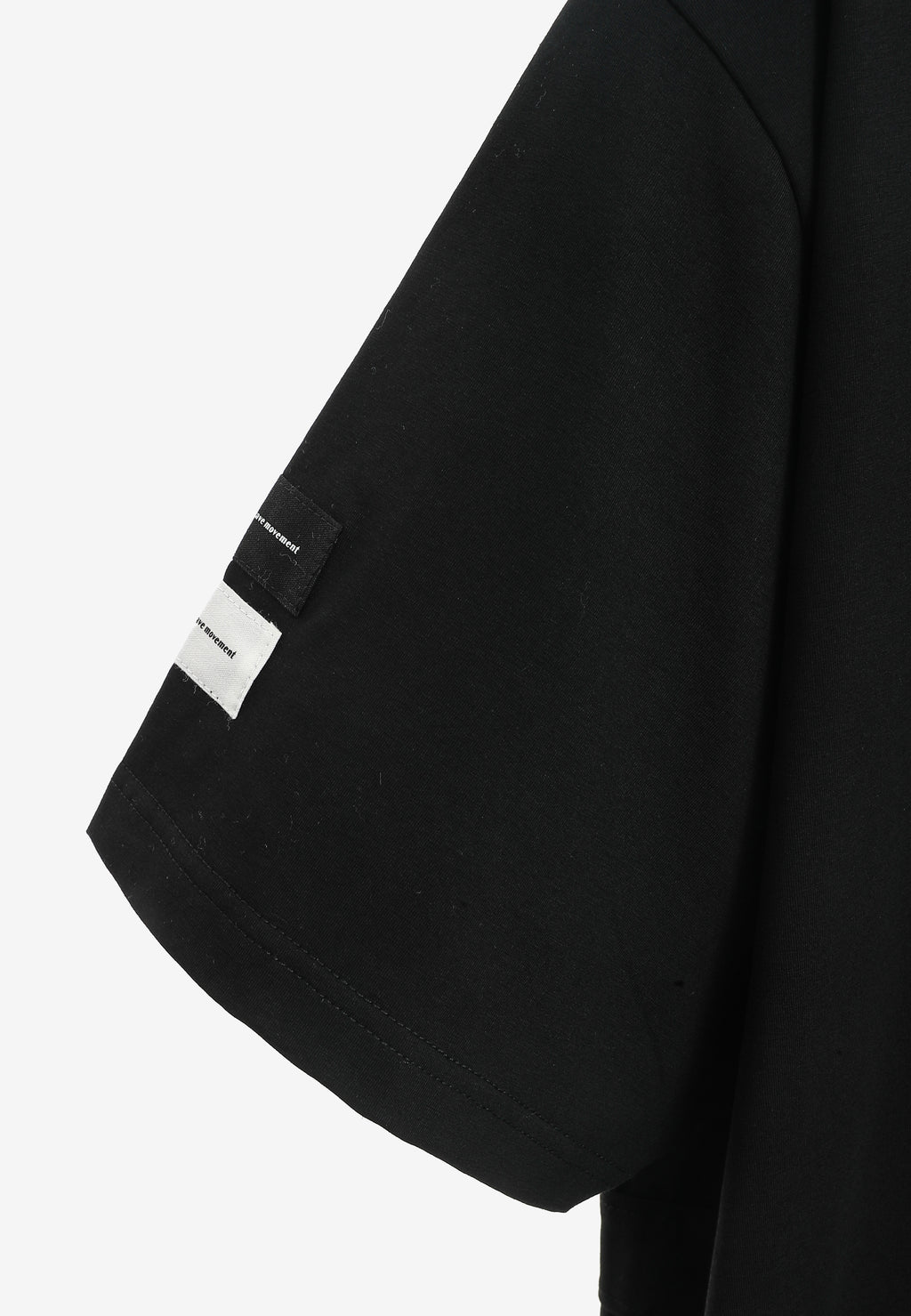 Camiseta de corte relajado con diseño entrelazado y tachuelas en los hombros | MWM [PS_COLORS:BLACK]
