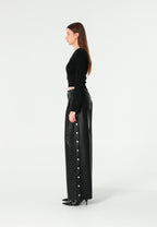 Pantalón de pierna ancha efecto piel con botones metálicos laterales | MWM [PS_COLORS:BLACK]